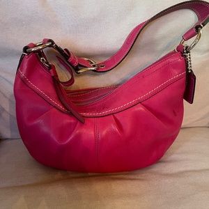 Pretty in pink leather authentic Coach handbag.